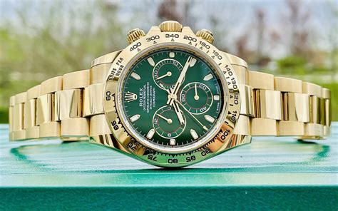 rolex daytona gold with green face|gold rolex with green dial.